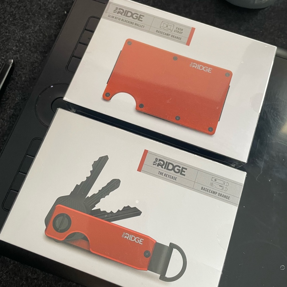 The ridge keycase and wallet in basecamp orange